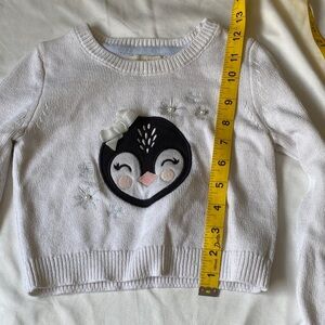 Adorable White Kids Sweater with Penguin Design